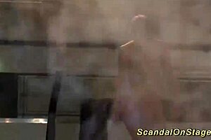 extreme babe squirts hard on public stage with big tits!