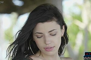 Petite Asian and Russian teen lesbians pose naked outdoors.