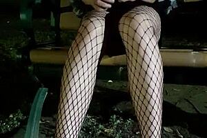 Tingting the femboy masturbates outdoors, squirting climax on fishnets