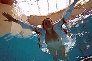 Big tits redhead Lola goes nude underwater in pool 😍