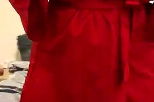 Brunette in red lingerie plays with herself