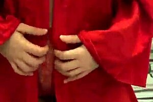 Brunette in red lingerie plays with herself