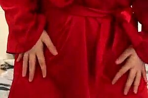 Brunette in red lingerie plays with herself