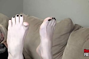 Sierra Cure allows a stranger to both suck and have sex with her big feet in a video