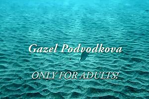 Gazel disrobes underwater, in her seductive pose