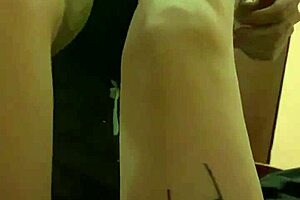 Ukrainian amateur with small tits performs footjob fetish. She licks her fingers.