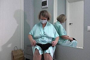 The voluptuous blonde housewife tries new underwear and toys and shows off her curves and bushed allure