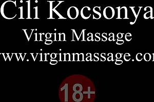 Virgin brunette babe Cili Kocsonya gets her round ass oiled and massaged