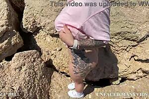 blonde moans loudly while squirting by the sea