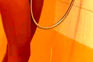 brunette with tattoos gets horny in the shower, shaved and hairless for her friend