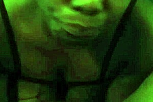 ebony babe passionately sucking on a huge black cock while moaning loudly in intense scene