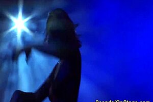 blonde gives emotional lapdance on public stage with clothes ripped