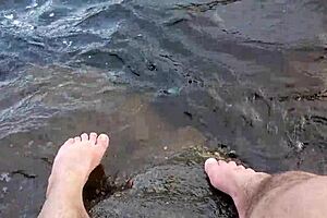 Mikas with sexual appealing fatty figure and big feet takes a bath in the sand