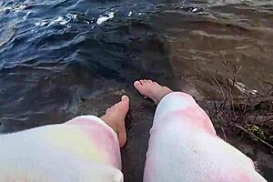 Mikas with sexual appealing fatty figure and big feet takes a bath in the sand