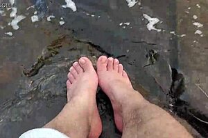 Mikas with sexual appealing fatty figure and big feet takes a bath in the sand