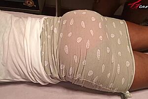 Black slut pleasures her man with an erotic rub down and hand job