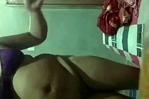 I watch this Indian milf use dildo on her pussy in webcam show