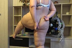 Curvy BBW Milf Shakes Big Ass in Satin During Christmas Session