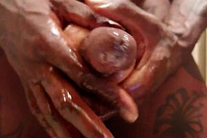 hallelujah johnson wanks hairy cock with pocket pussy close up