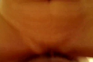 Asian wife rides to orgasm, surprising her husband.