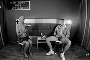 Short haired babe experiments with enema and milk