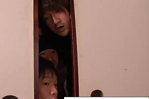 Japanese girl fingers pussy while boys watch