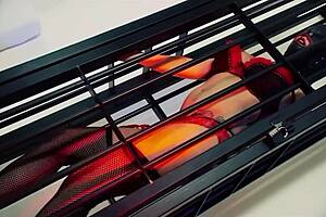 the naughty brunette escapes her tight cage, bound in stockings, to worship the beautiful woman's big tits and ass