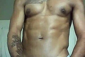 Ebony guy talks while beating his monster black cock in amateur scene