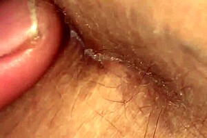 Nicholas watches a tight striptease dancer rip her clothes at the night club.