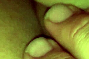 Nicholas watches a tight striptease dancer rip her clothes at the night club.