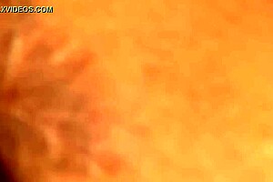 Nicholas watches a tight striptease dancer rip her clothes at the night club.