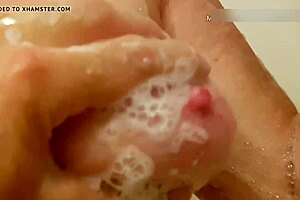 mature wife bathes in shower, showing natural tits and washing pussy homemade