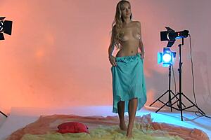 Teen model poses nude in golden hair photoshoot