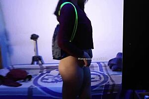 The purple toy gets spanked with a cane, plus the man takes the woman’s butt in a doggystyle position
