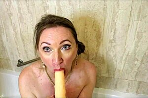 mariaold milf with huge boobs gives blowjob and tittyfuck