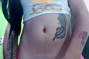 TRANSSEXUAL babe in PINK undies MASTURBATES on cam