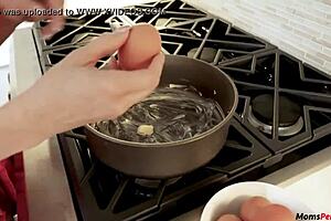 stepmom gives blowjob to stepson while he's cooking