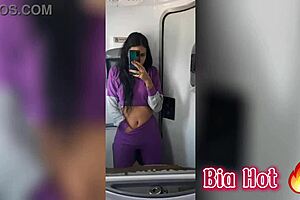 Bia masturbates in the bus bathroom