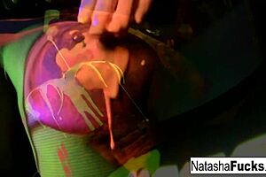 busty natasha nice shoots a fun black light video