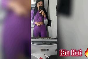 Bia masturbates in the bus bathroom