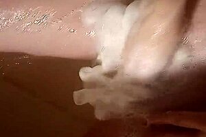 Roxanne and Xander enjoy wet shaved pussy in the shower.