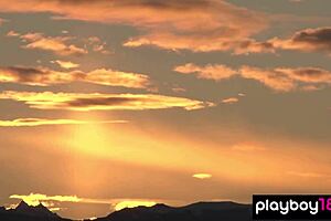 Erotic naked yoga session where big boobed Daniella Smith and her busty girlfriend explore each other's bodies.