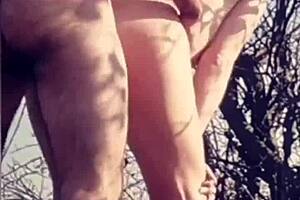 I push his cock deep down her throat in the field for face fucking