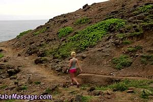 Lesbian masseuse provides relaxing oral massage