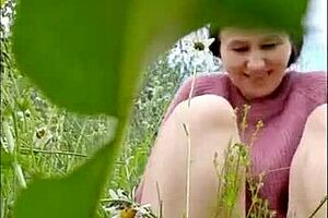 Naked Horny Milf Masturbates In Chamomile Field!