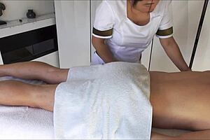 asian masseuse in uniform gives huge orgasm during oiled massage