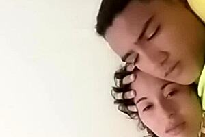 Intimate Moments Between a Charming Couple in Bed