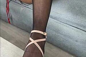 kenia tease video wearing black stockings and red satin dress