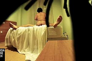 Hidden cam spies on fat woman giving oral sex