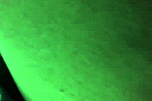 Cute girl paces through the store while spied on hidden cam outdoors.